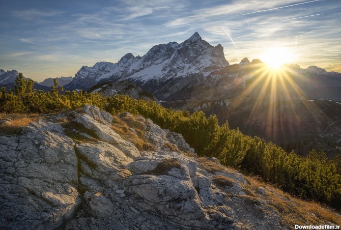 عکس زمینه قله کوه برقی و طلوع خورشید پس زمینه | والپیپر گرام