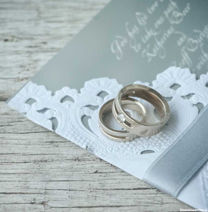 تصویر با کیفیت حلقه ازدواج و کارت عروسی