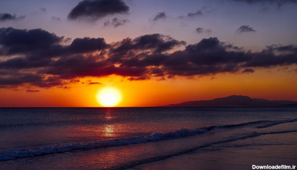 دانلود عکس از غروب زیبای آفتاب در ساحل با کیفیت 4k