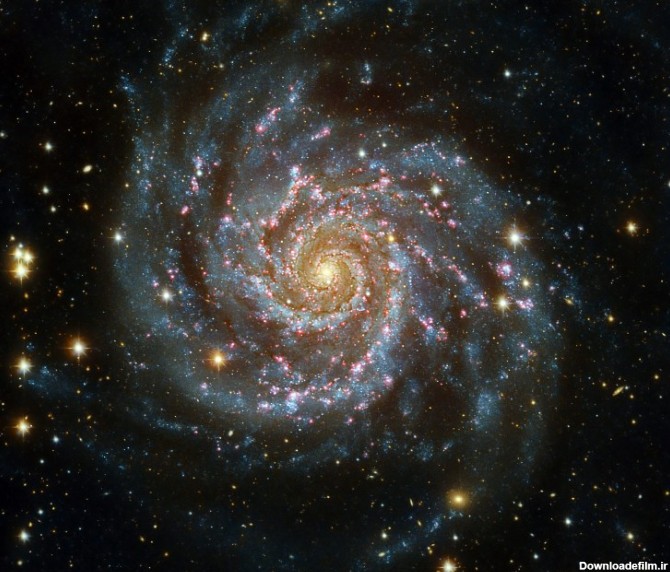 تصویری از کهکشان مارپیچی M74 که یک کهکشان شبیه کهکشان راه شیری ماست.