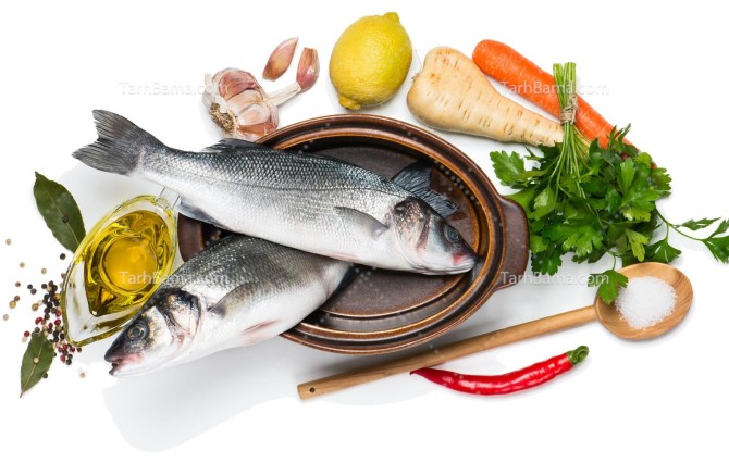 تصویر با کیفیت ماهی قزل آلا در قابلمه کنار وسایل آشپزی