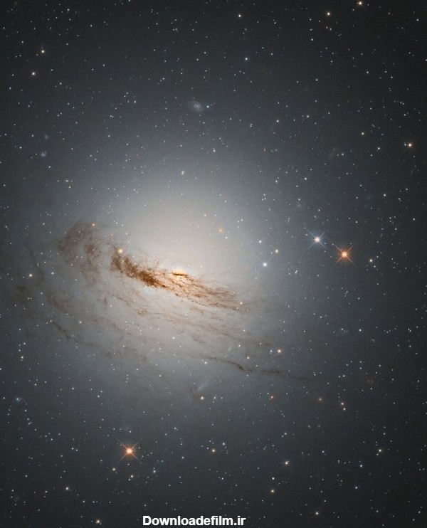 تصویر تلسکوپ هابل از یک کهکشان عدسی – اسپاش