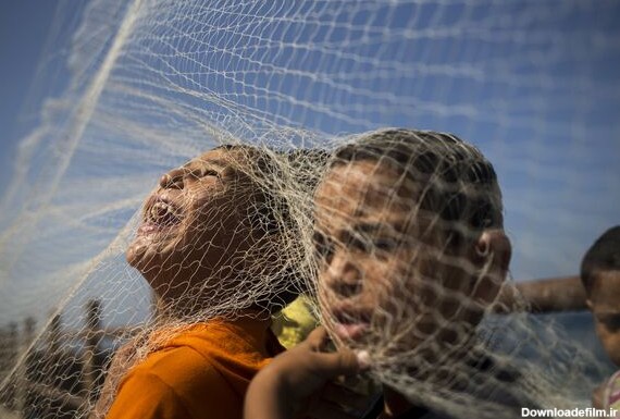 بازی بچه های فلسطینی  با تور ماهیگیری - اسپوتنیک ایران