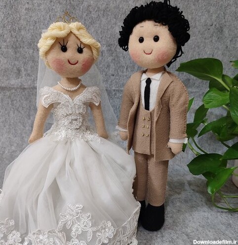 عروس و داماد عروسکی که قابلیت ایستادن را دارند با لباس های جذاب و بی نظیر کار شده از روی عکس مشتری