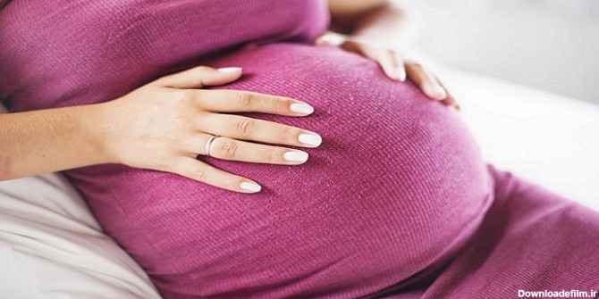 pregnant fetus kicking 0 - لباس مناسب حاملگی، چگونه باشد؟