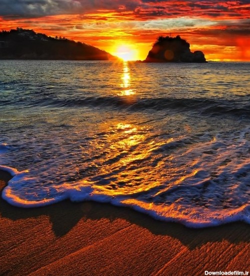 عکس طلوع خورشید در ساحل دریا