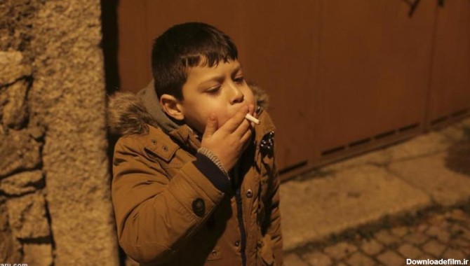 فرارو | (تصاویر)مراسم جنجالی سیگار کشیدن کودکان پرتغالی