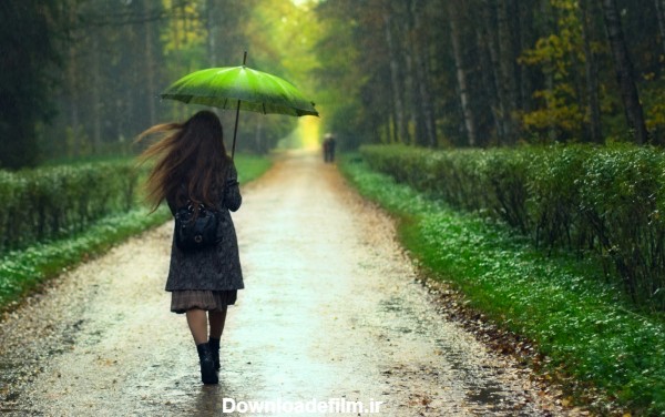 عکس دختر با چتر زیر باران girl rain forest road