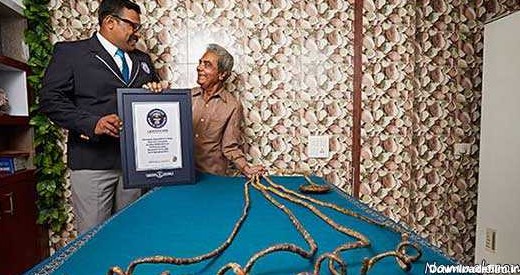 بلندترین ناخن دنیا با 9 متر طول + عکس