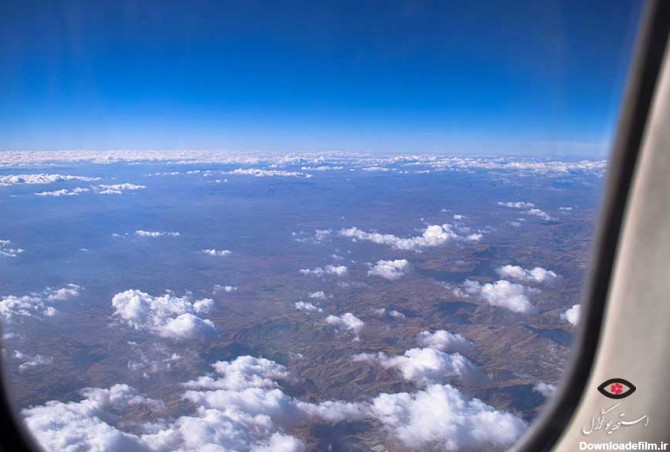 عکسی از ابرها از پنجره هواپیما وطبیعت قشنگ ایران از بالا