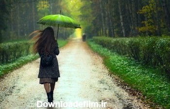 عکس دختر با چتر زیر باران girl rain forest road
