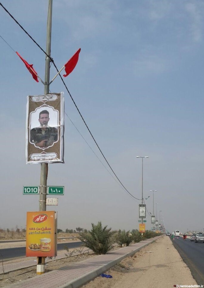 تعویض تابلوهای «شماره عمود» مسیر کربلا توسط خادمان ایرانی (+عکس)