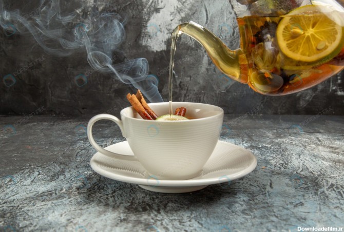 عکس ریختن چای از قوری در فنجان - مرجع دانلود فایلهای دیجیتالی