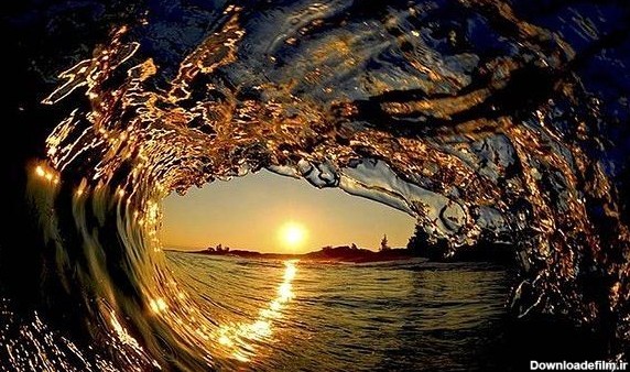 آخرین خبر | عکس/ منظره غروب آفتاب از داخل یک موج