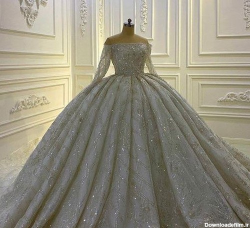 مدل لباس عروس ۲۰۲۳ آستین دار و دامن پرنسسی بسیار زیبا
