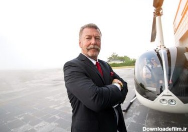 دانلود عکس افراد تجاری در حال سفر با هلیکوپتر از یک بالغ