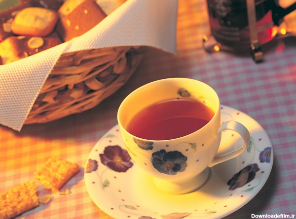عکس فنجان چایی با طرح گلهای رنگی - مسترگراف