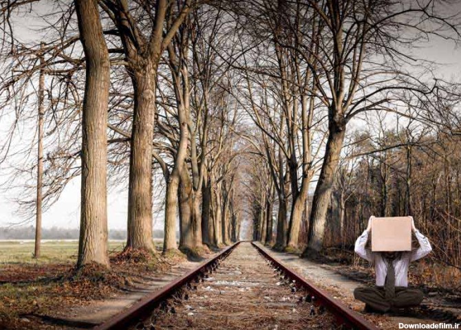 تصویر باکیفیت ریل قطار و مرد