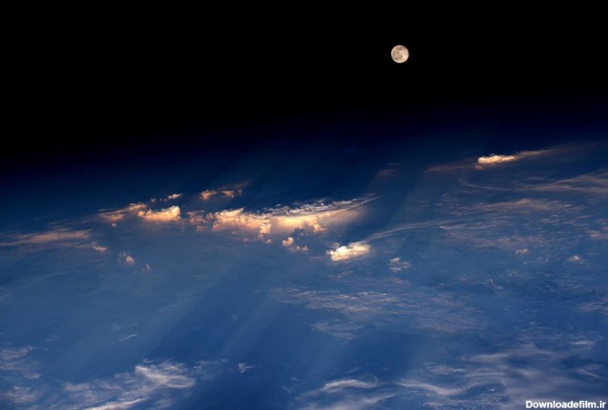 ماه کامل بر فراز ابرها از منظر فضا - تابناک | TABNAK