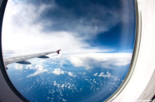 عکاسی حرفه‌ای از پشت پنجره هواپیما - مجله گردشگری