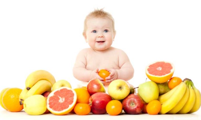 دانلود تصویر زیبا از بچه و میوه ها