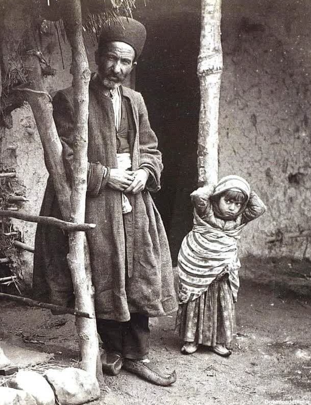 دختر بچه و پیرمرد / عکس از آنتوان سِوریوگین - حوالی 1900 - همیار