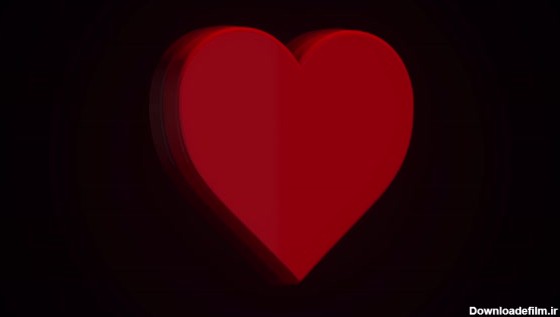 انیمیشن یک قلب قرمز در حال چرخش در پس زمینه سیاه