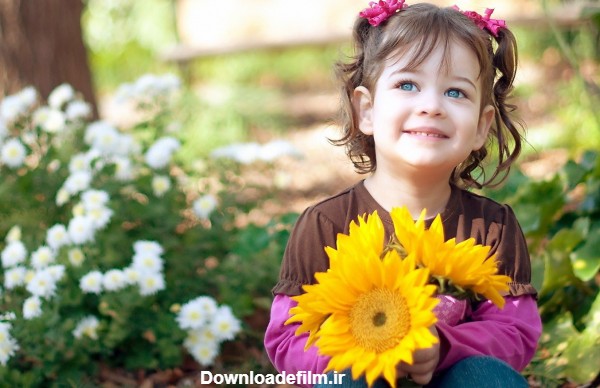 عکس دختر بچه با گل زیبا baby girl beautiful flowers