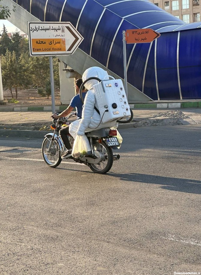 حرکت فضانورد موتورسیکلت‌سوار در شهرزیبا+عکس