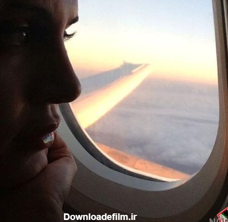 عکس دختر پشت پنجره هواپیما - عکس نودی