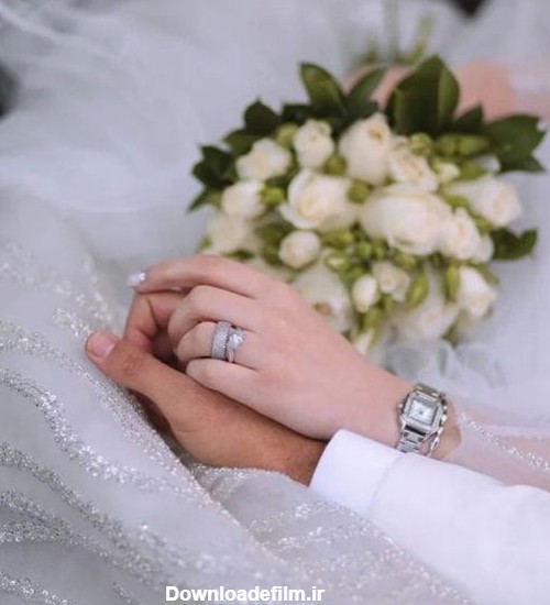 عکس حلقه ازدواج در دست عروس و داماد