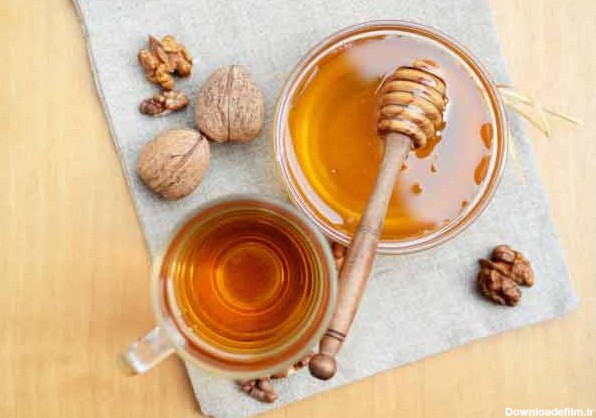 عسل و گردو صبحانه کامل و انرژی زا | عسل و آجیل و خواص درمانی آن ...