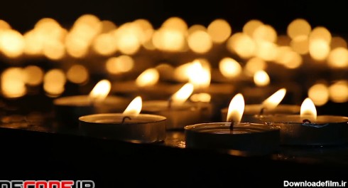 دانلود استوک فوتیج : شمع ها در زمینه مشکی Group Of Burning Candles ...