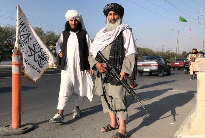 معشوقه سلاح به دست یک عضو طالبان + عکس
